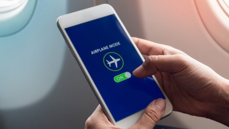 Why are you asked to put your phone in 'flight mode' on an airplane?